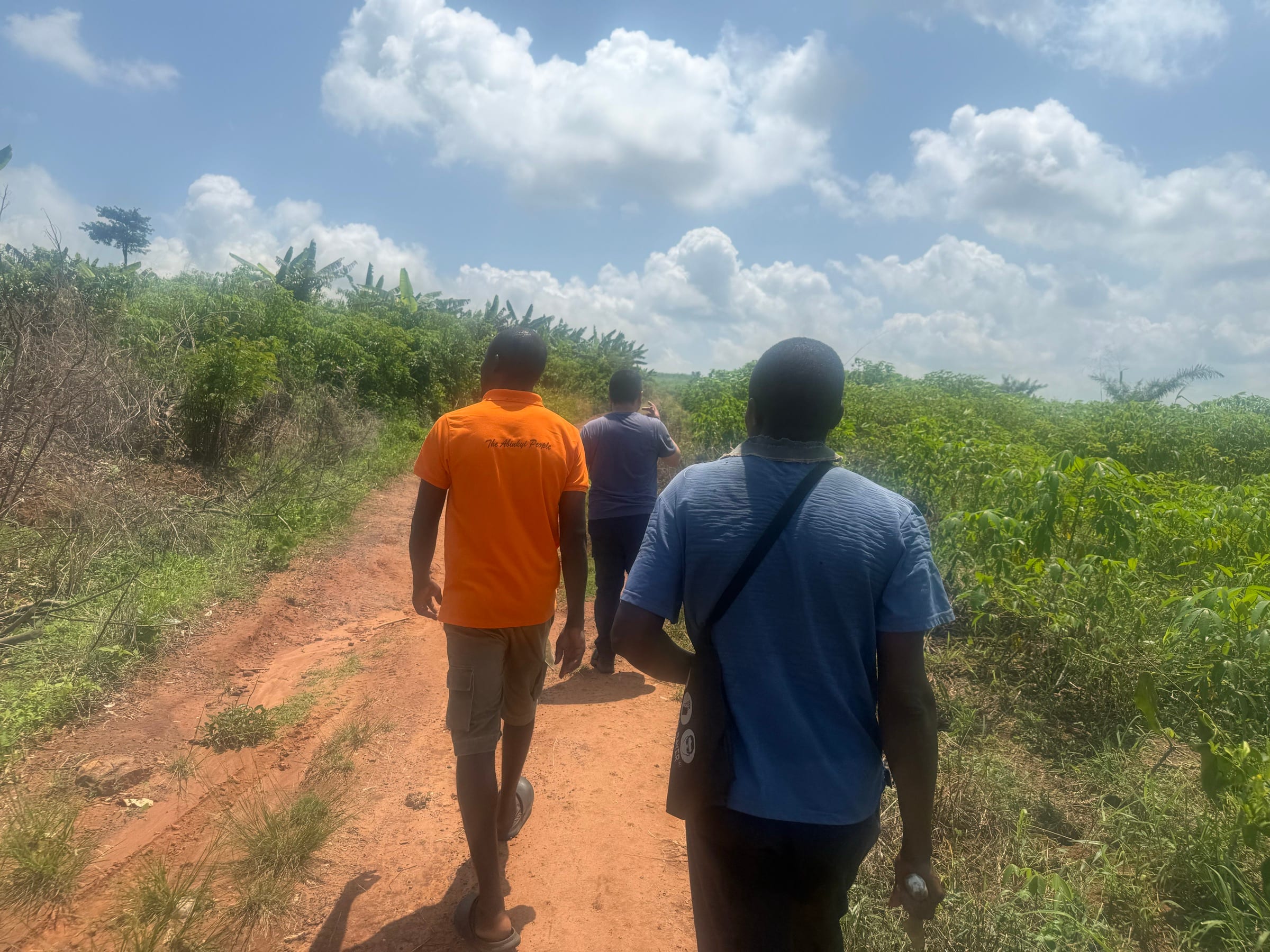 Fairways.Tech team walking along a rural field path